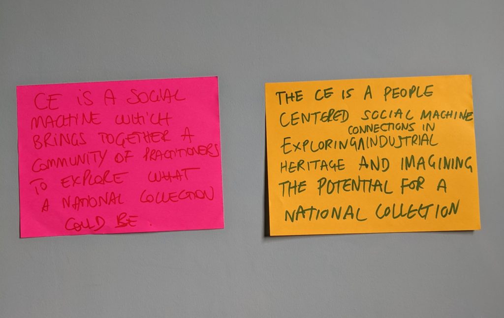 A pink and orange post-it note stuck side by side with two draft versions of text for the North Star written on.